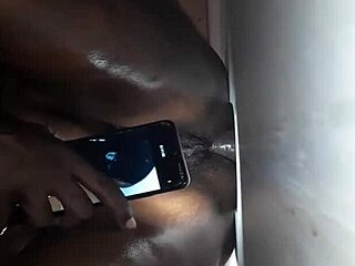 Stroking pussy raw at gloryhole with ebony milf