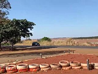 Bibi Tsunami interacts with people on the roadside in Varjão de Minas, MG.