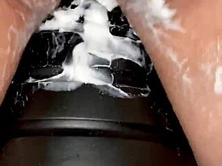 Bizarre anal tower dildo play up close.