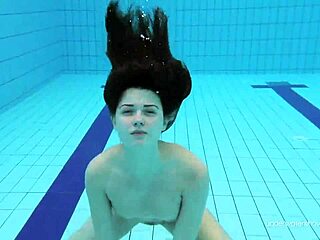 Red swimsuit beauty katy with bushy pussy underwater