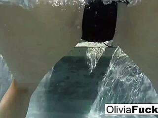 Horny Olivia Teases Her Pussy Underwater