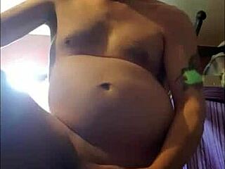 a shy bisexual male, naked in a homemade video, shoots a big cumshot during amateur play