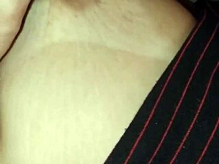 Filming her gorgeous tits while she slept.