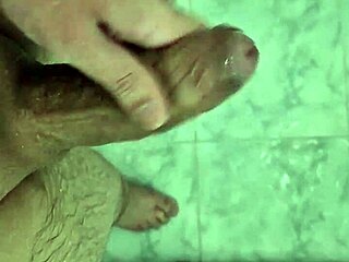 Cute young twink cums deliciously in the shower with neighbors watching