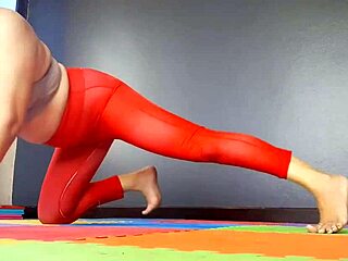 Regina Noir yoga pants a woman in yoga leotards practices yoga in the gym transparent red leotard yoga