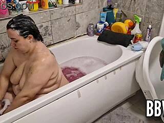 perv caught spying on bbw washing huge floppy tits in bath...oops!