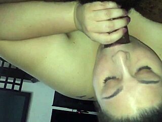 White amateur sucks black cock in homemade interracial scene.