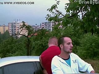 Girl gets facial through car window in wild public gangbang orgy on the street