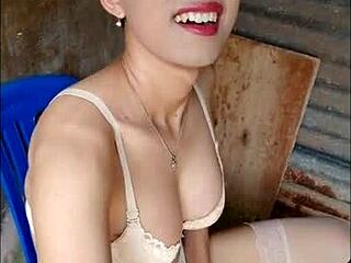 amateur shemale toys herself nervously in an open bathroom setting