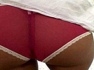 Fucking a shaved brunette wearing white high heels.