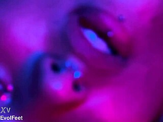 even while smoking, she worships his feet with licks and sucks