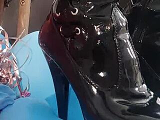 Veve Pops Balloons in Latex Stockings Using Sharp Object with Her Big Tits Exposed