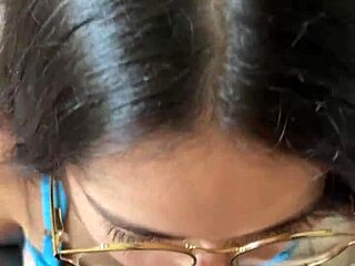 Nerdy brunette with big natural tits gives deep blowjob to Wellington Prado's big cock in jeans shorts by the mirror.