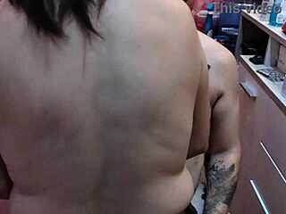 Barber babe showcases her perfect natural tits in a casual setting