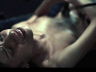 Feral girls kiss and scissor roughly in slime-covered lesbian sex.