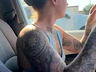 Girl attempting to adjust her sports bra in the gym parking lot