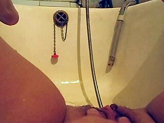 Busty milf indulges in PISS and urine wash fetish. Amateur compilation shows her DIRTY bathtub play with chubby curves.