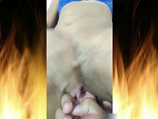 beautiful brunette slips into blue lingerie, teasing with her curvy body and wet pussy in this solo trailer