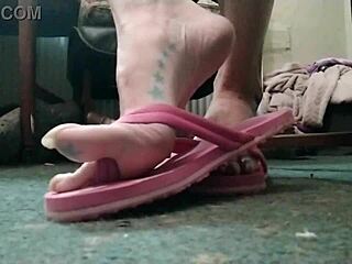 huge talons on curvy exotic feet with long nails and flip flops in sexy display