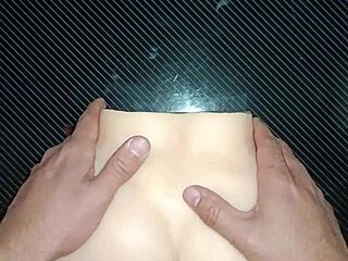 In this homemade clip, a real doll gets bent over the desk for doggystyle anal and pussy fucking. Cum drips from her gaping asshole after a creampie and slap.