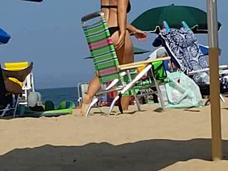 Candid Bikini Slut Exposed on Beach with Tight Ass in Hidden Shot