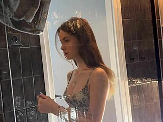 petite cheerleader coed lifts miniskirt in bathroom flashing panties then pussy