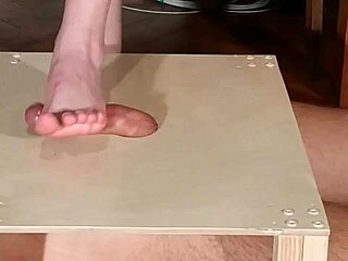 Domina stomps slave cock barefoot then footjobs it hd